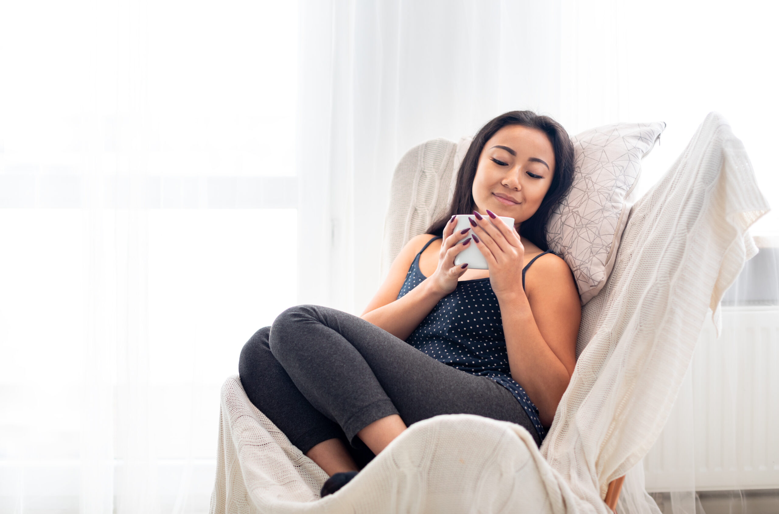 Woman relaxing on chair