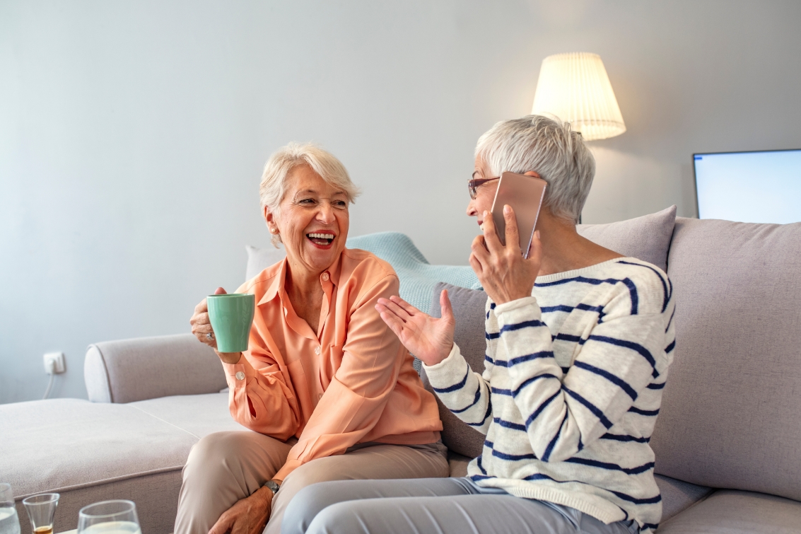 Two women drinking coffee while waiting for Furnace Repair in Trenton, OH